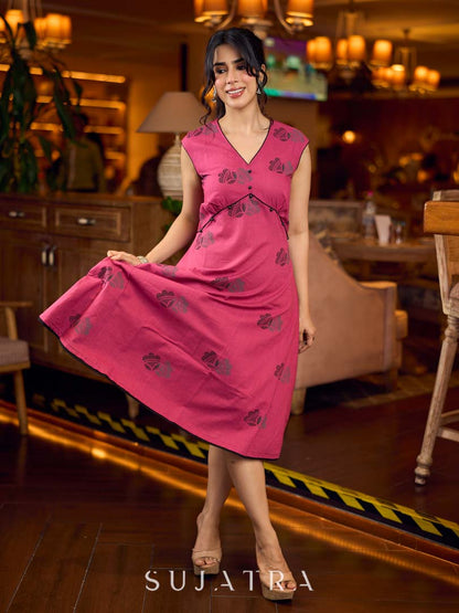 Rich wine drop-shoulder dress with black and grey hand block printed floral motifs, a softly gathered yoke, black pearl embellishments, and bold black accents for a striking artisanal look.