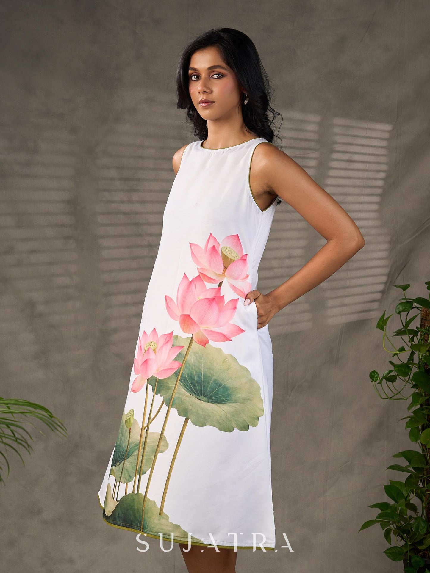 Graceful White lotus printed dress with elegant olive accents.