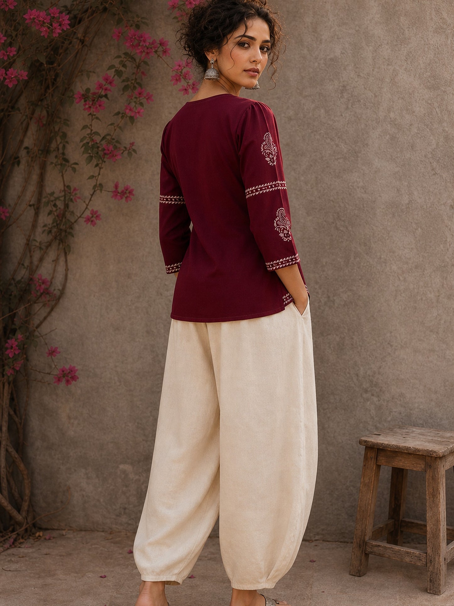 Graceful maroon hand block print top featuring timeless paisley motifs, delicate borders, and an elegant V-neck silhouette, crafted for effortless everyday sophistication.