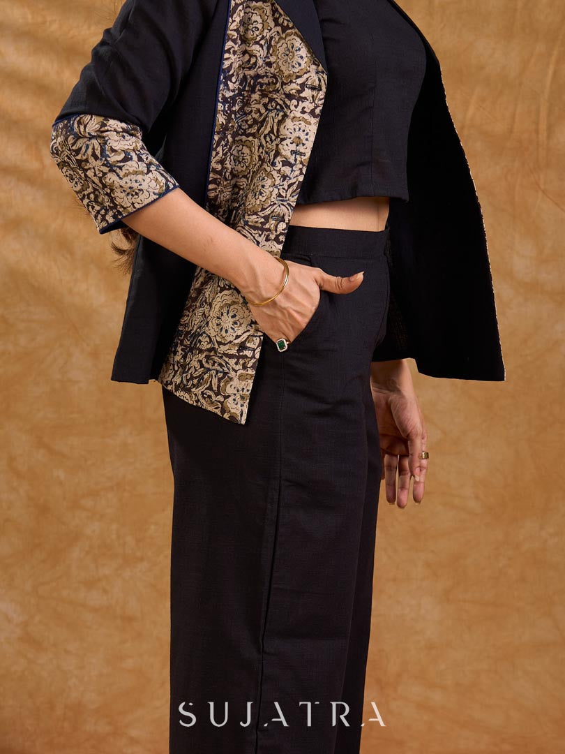 Elegant black and navy Kalamkari jacket featuring a notch collar and subtle navy accents, creating a graceful, tailored silhouette suited for polished corporate wear.