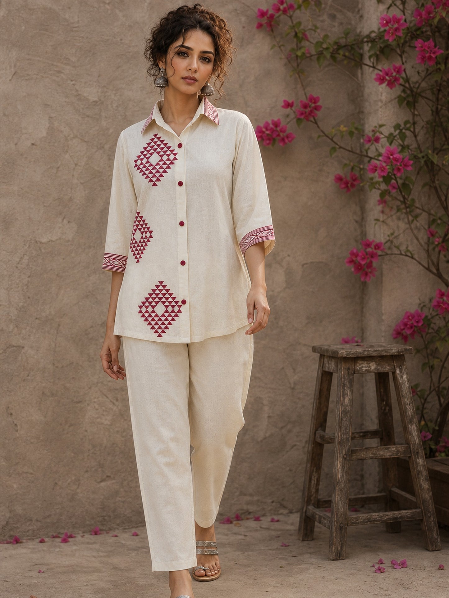 Vibrant ivory hand block print shirt featuring geometric motifs, magenta accents, and a contemporary silhouette inspired by traditional craftsmanship.