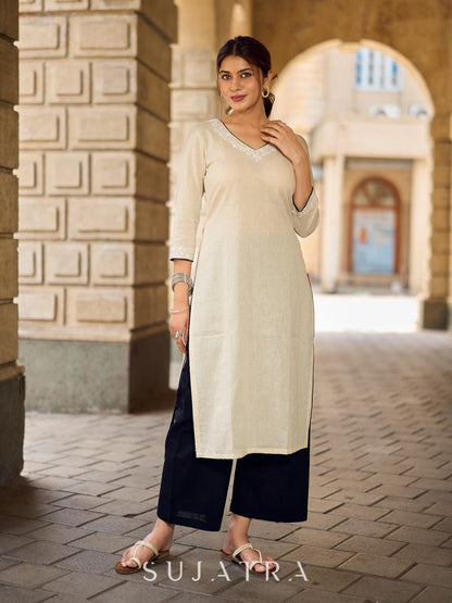 Pristine Off-White Cotton Flex Straight Kurta Featuring Subtle Monochrome Embroidery on Neckline & Sleeve Cuffs