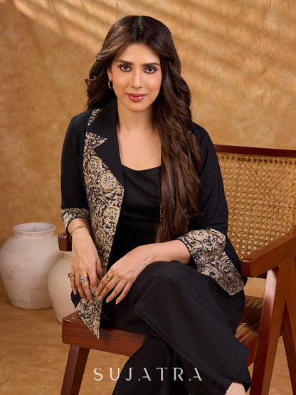 Elegant black and navy Kalamkari jacket featuring a notch collar and subtle navy accents, creating a graceful, tailored silhouette suited for polished corporate wear.