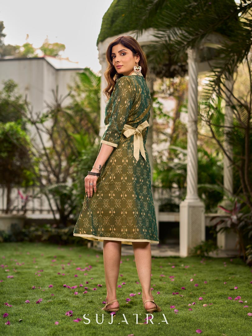 Statement olive green two-tone Ikat dress elevated with cream and gold accents, a structured belt for definition, and a subtle left-front slit.