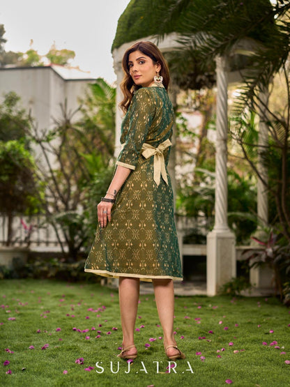 Statement olive green two-tone Ikat dress elevated with cream and gold accents, a structured belt for definition, and a subtle left-front slit.