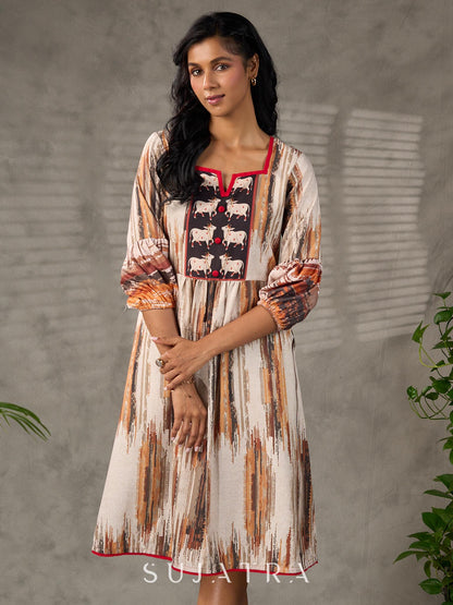 Heritage Pichwai inspired abstract cow motifs dress with red details