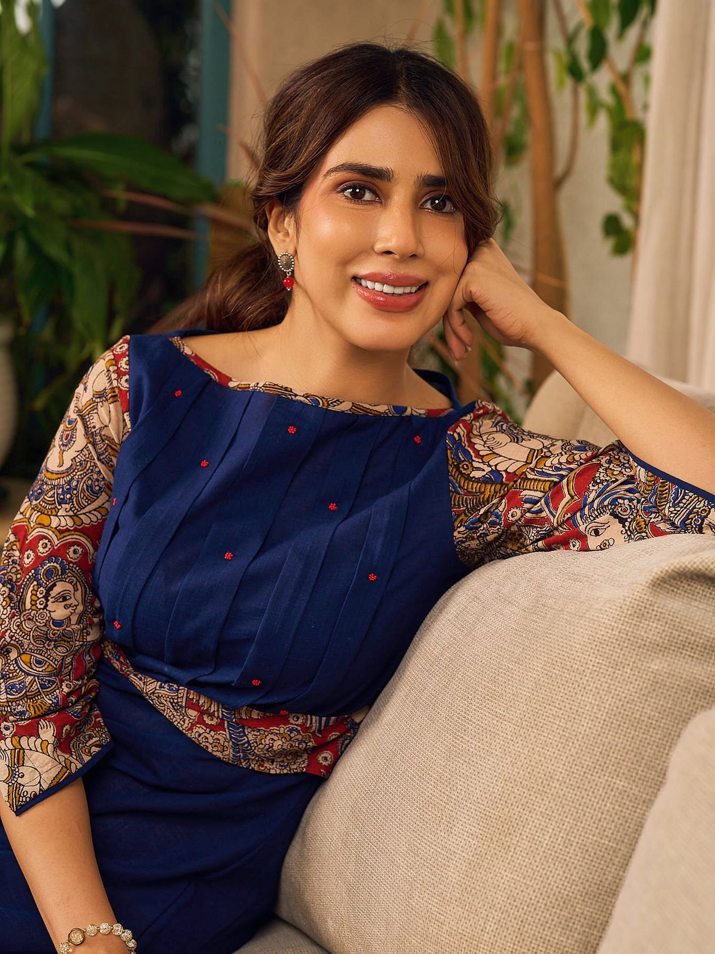 Navy Blue Artisanal Kalamkari prints enhanced with statement sleeves and a waist-defining knotted Kalamkari belt.