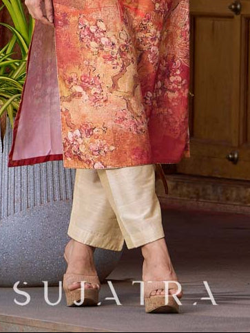 Elegant cream cotton-silk pants with subtle gold accents.