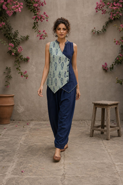 Indigo fish-print crossover sleeveless top featuring a mirror-laced Mandarin collar and beautifully scalloped cut hem.