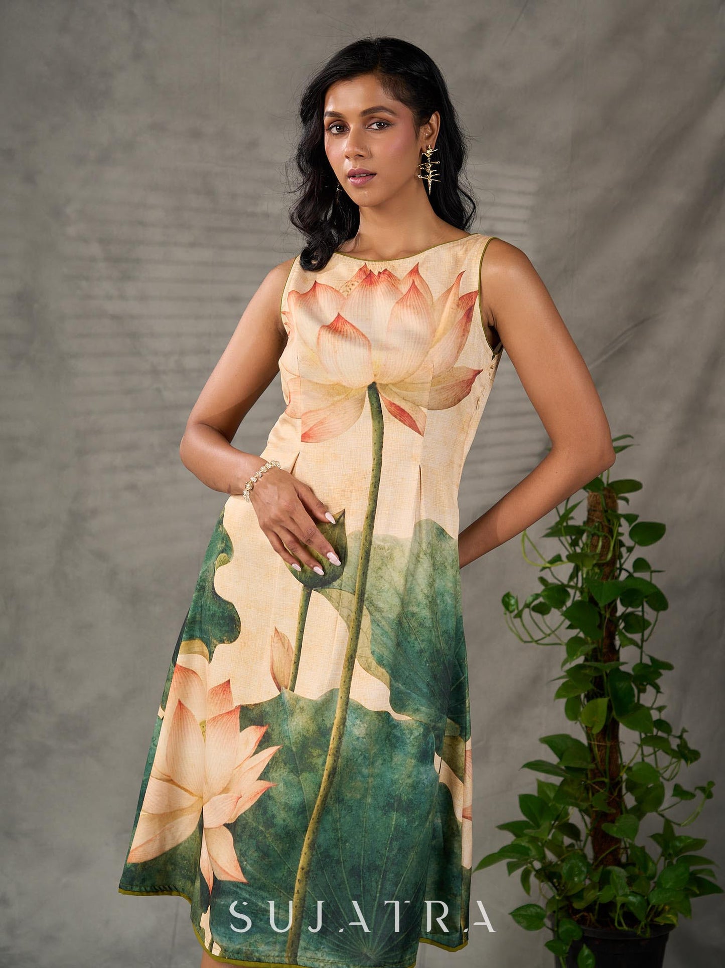Statement Cream lotus motif dress with earthy olive accents.