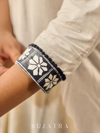 Timeless Off-White Cotton Kurta Featuring Hand Painted Warli Folk Art Yoke & Cuff Band