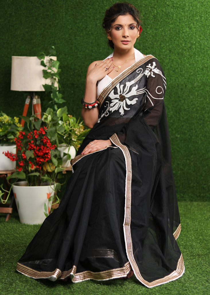 Serene black Chanderi saree with elegant handwork & border