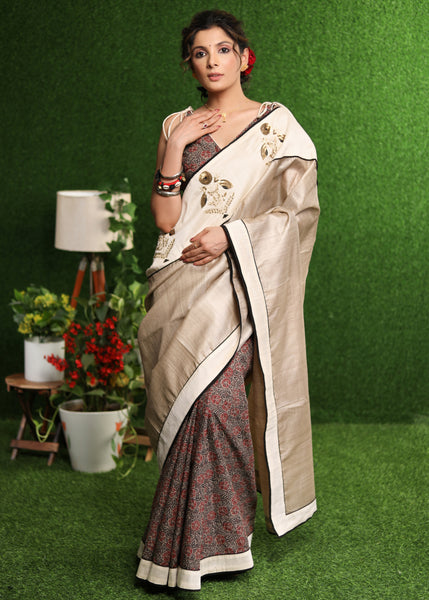 Graceful Tusser silk & Ajrakh combination saree with delicate beige silk sequence embroidery