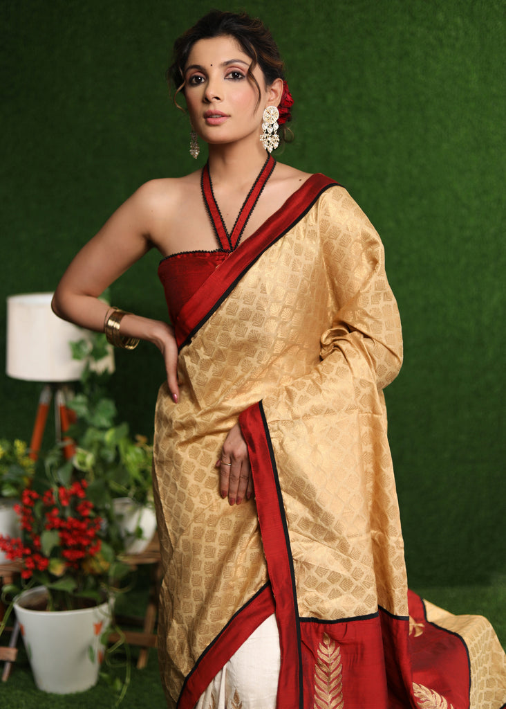 Exclusive off-white Cotton silk with gold brocade saree & Zari motif on pleats