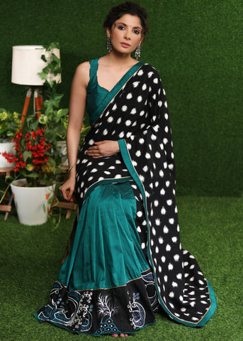 Exquisite black double Ikat & turquoise combination saree with hand painted Gond border