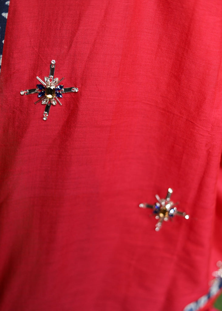 Graceful pink Cotton saree with silver stone embellishment and indigo border