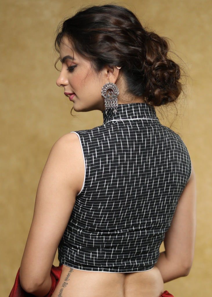 Smart black Ikat sleeveless blouse with Mandarin collar and white detailing