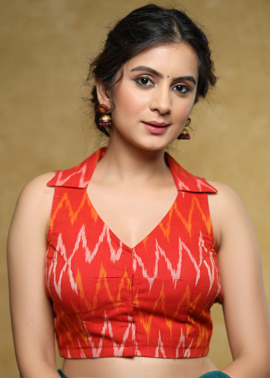 Graceful orange Cotton Ikat sleeveless blouse with smart collar and back