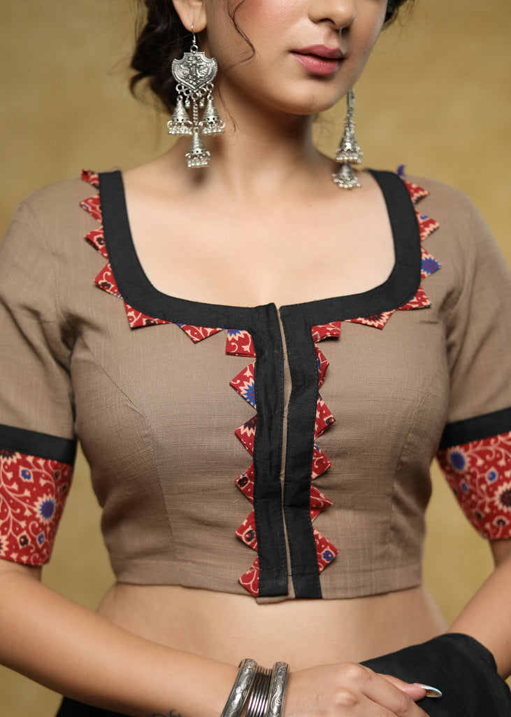 Smart light brown Cotton blouse with red printed detailing on the sleeves