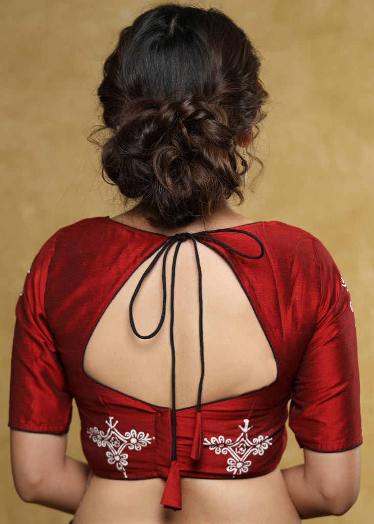 Graceful maroon cotton silk blouse with white hand painted motif on the sleeves & the back