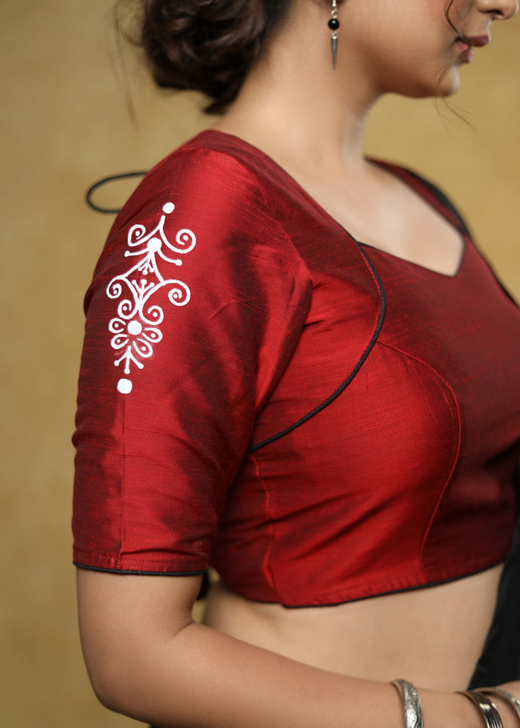 Graceful maroon cotton silk blouse with white hand painted motif on the sleeves & the back