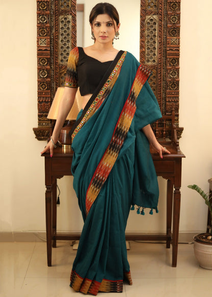Comfortable peacock green Cotton saree with beautiful mirror work & Ikat border