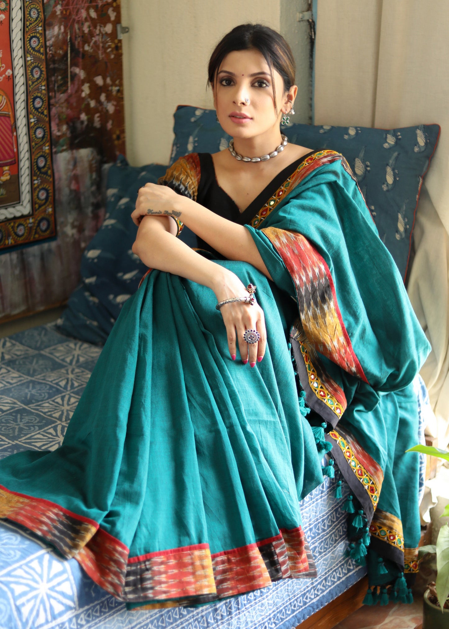 Comfortable peacock green Cotton saree with beautiful mirror work & Ikat border