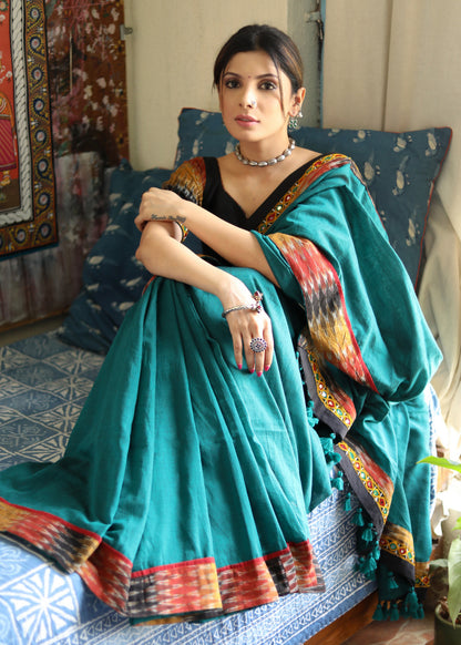 Comfortable peacock green Cotton saree with beautiful mirror work & Ikat border