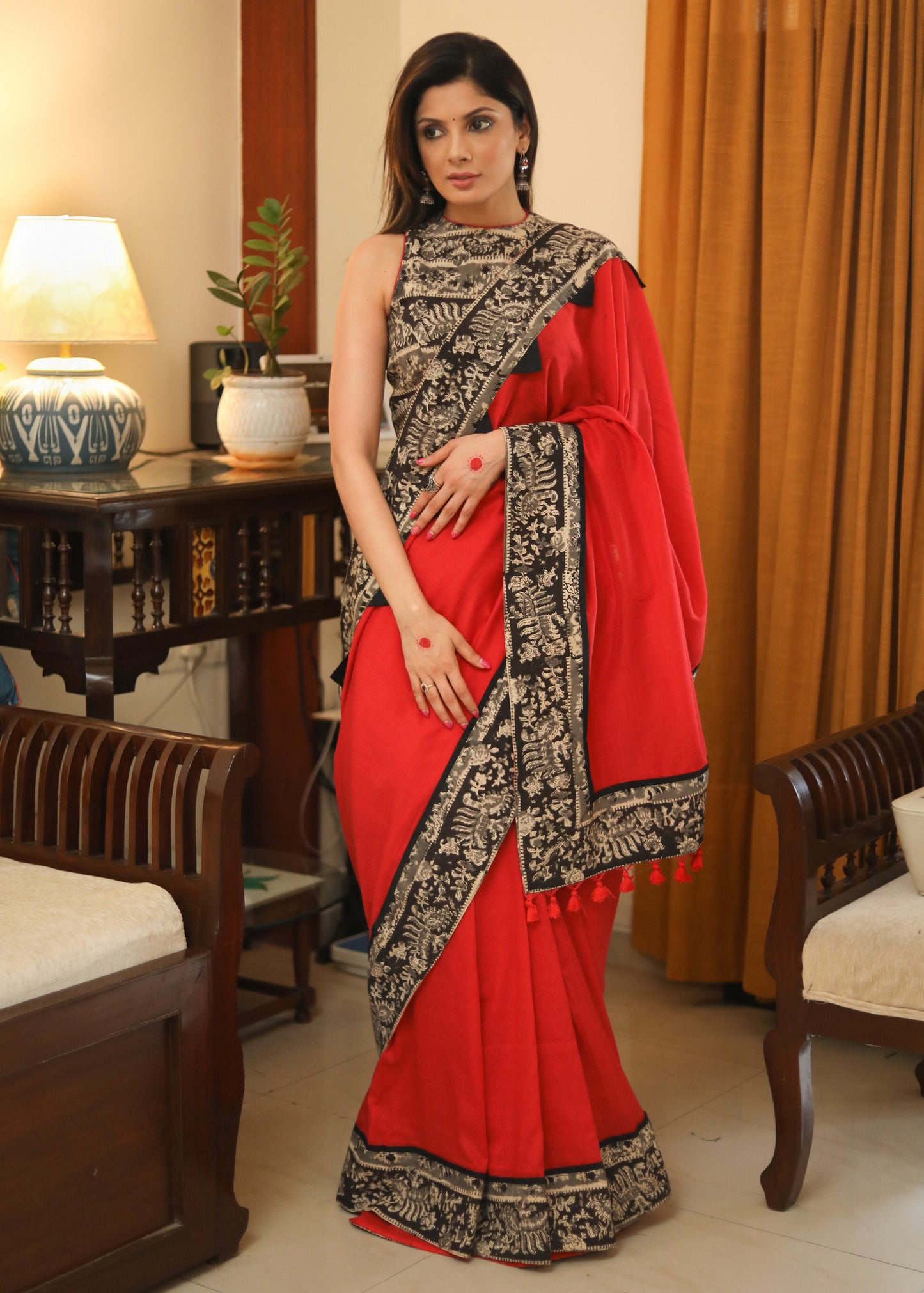 Beautiful red Cotton saree with black Kalamkari print border