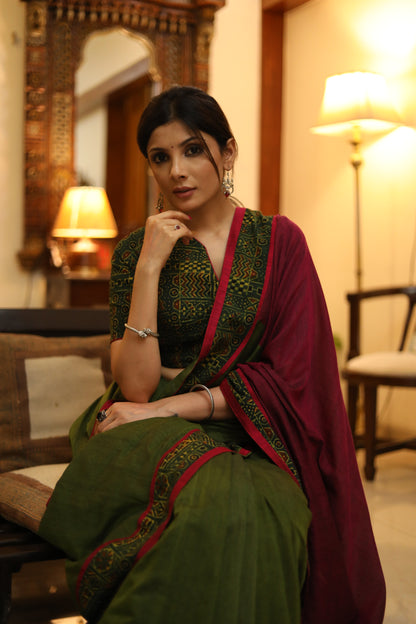 Versatile green and magenta combination Cotton saree with green Ajrakh border