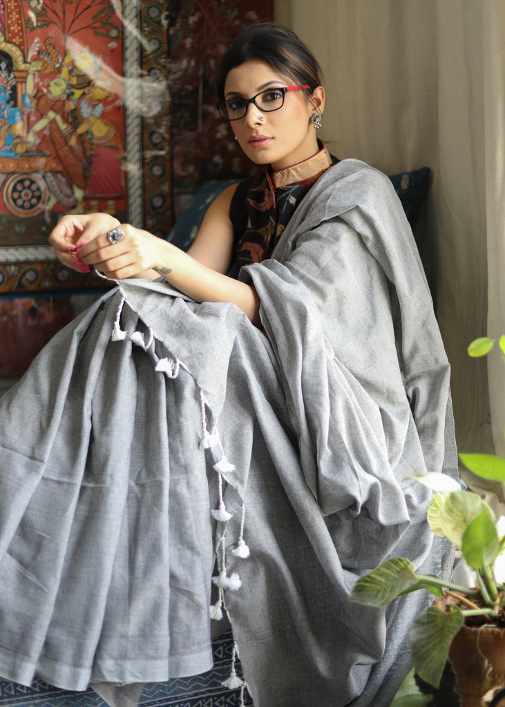Breezy slate grey Cotton saree with white tassel and Kalamkari blouse piece