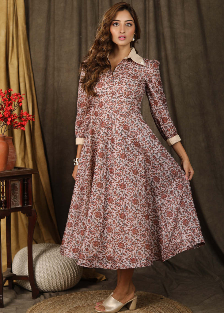 Trendy Kota silk collared dress with beautiful kalamkari print highlighted with pearl embellishments