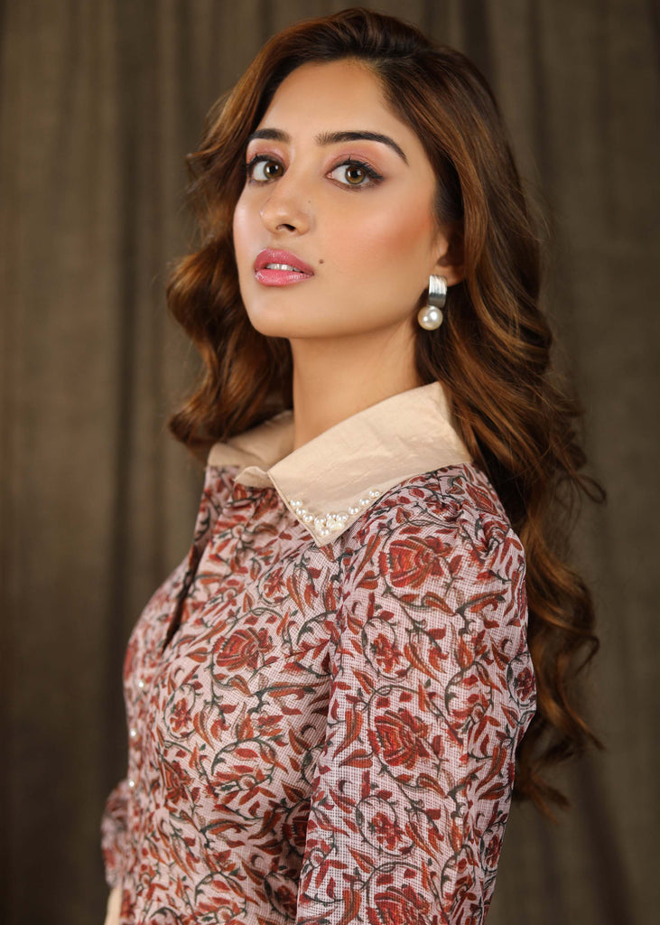 Trendy Kota silk collared dress with beautiful kalamkari print highlighted with pearl embellishments