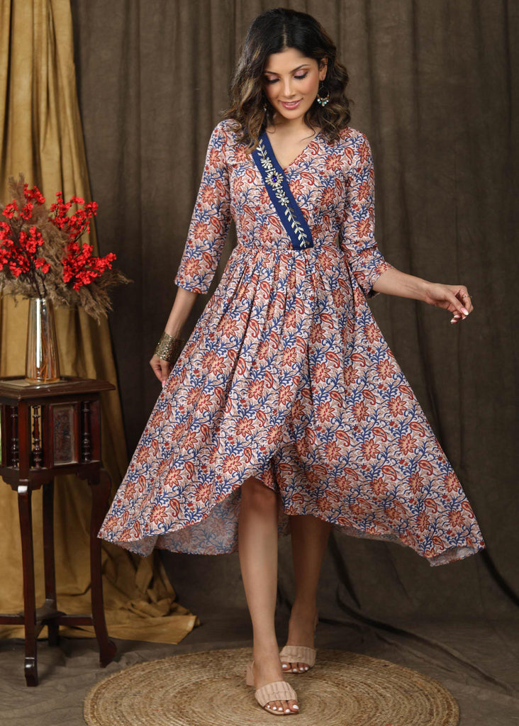 Beautiful floral paisley muslin overalap dress highlighted with classy stonework belt on the neckline