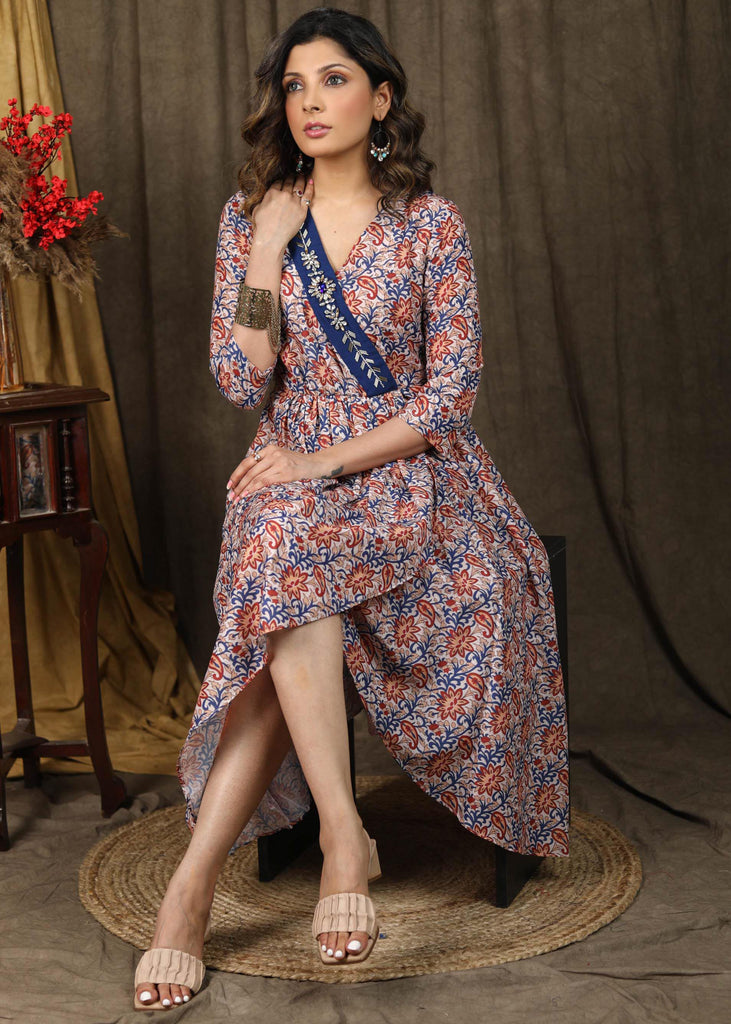 Beautiful floral paisley muslin overalap dress highlighted with classy stonework belt on the neckline