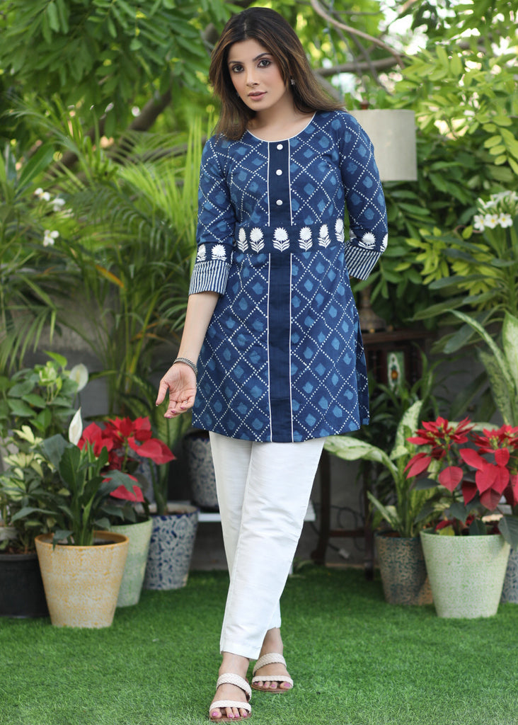 Smart Indigo Straight Tunic with White Floral Embroidery on Waist .