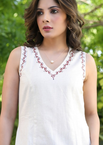 Off white sleeveless cotton dress with hand-painting on the neckline - Ajrakh jacket optional