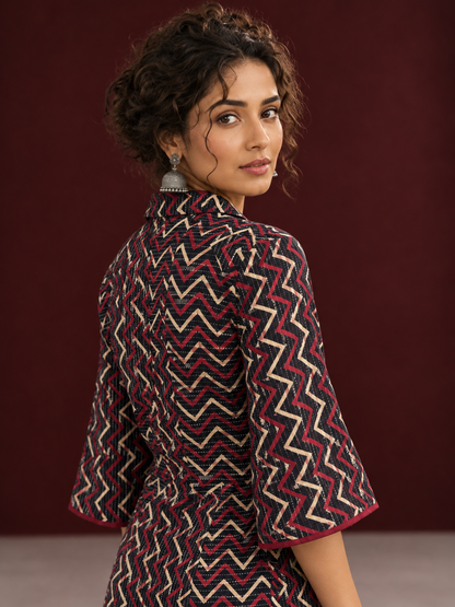 Bold Black Ajrakh Cotton Shirt Dress with Red & Beige Zigzag Print and Kantha Detailing — fabric detail