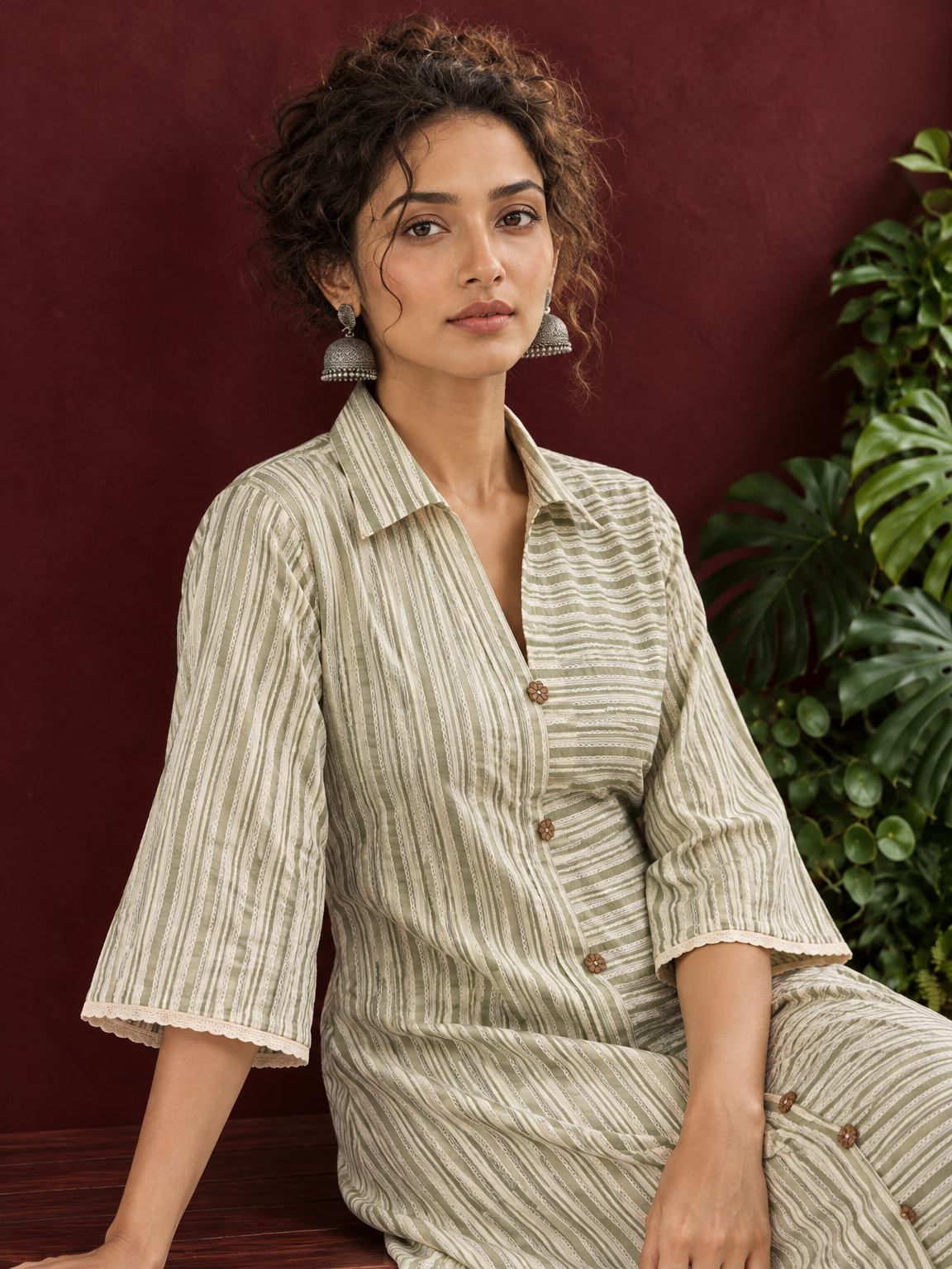 Sage Green Striped Cotton Shirt Dress with Contrast Buttons and Lace-Trimmed Cuffs — seated detail — view 5