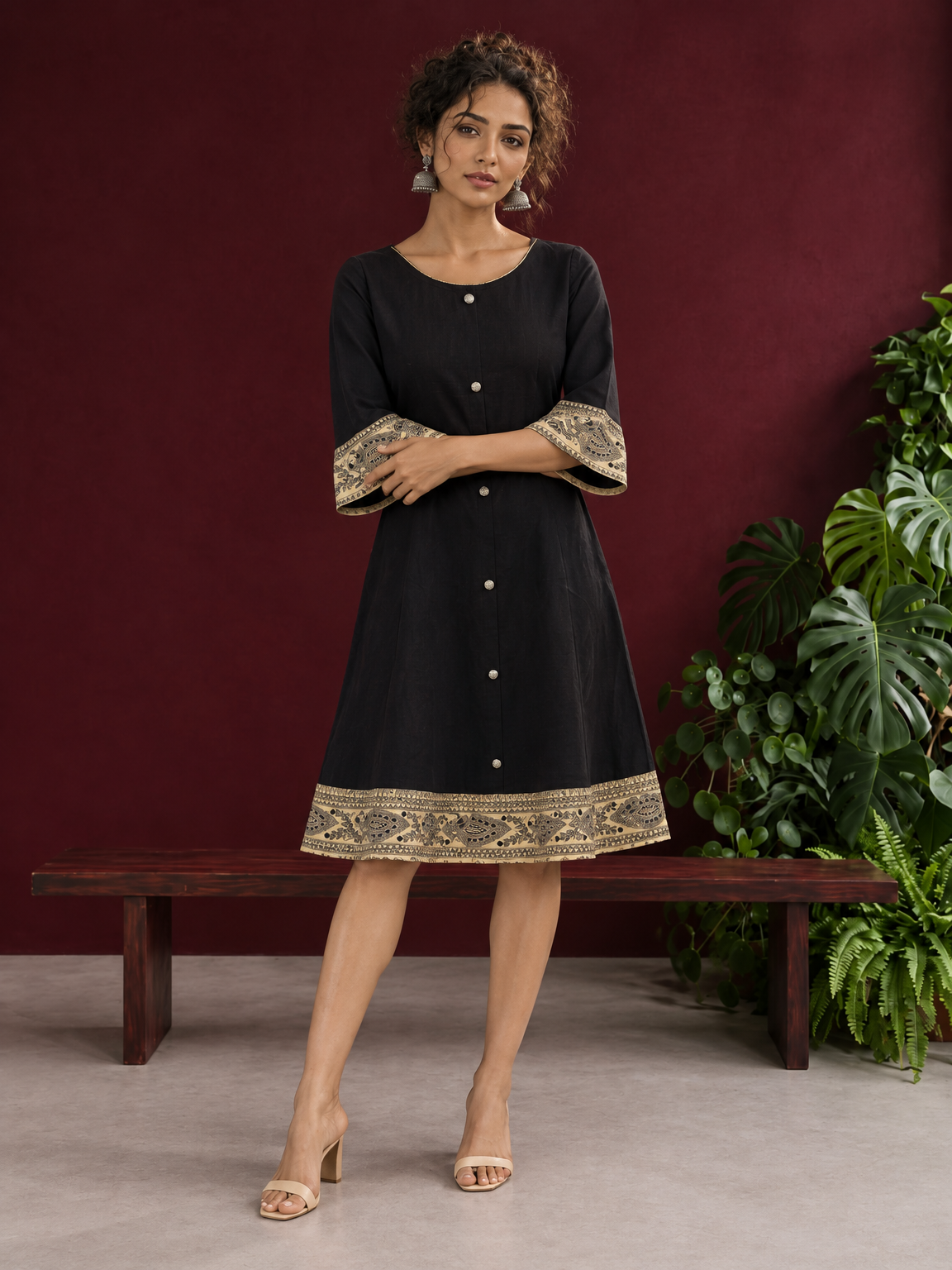Elegant Black Cotton A-Line Dress with Madhubani Print Border Hem and Matching Bell Sleeve Cuffs
