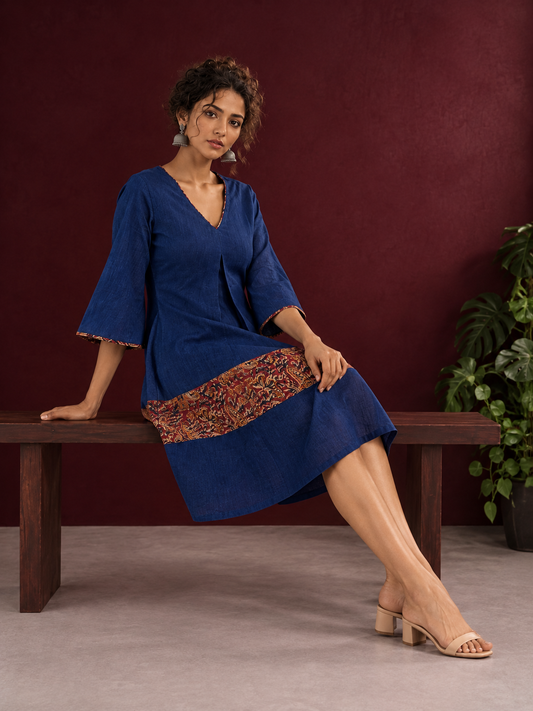 Timeless Navy Blue Cotton Dress with Kalamkari Print Hem Border & Contrast Neckline and Cuff Trim — seated