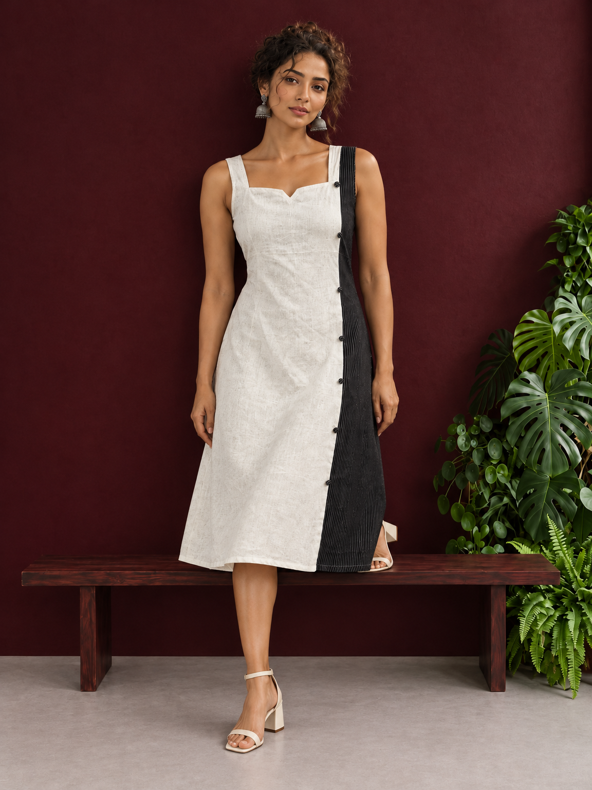Elegant Off-White Cotton A-Line Dress with Contrast Black Pinstripe Side Panel & Button Detailing — side view — view 3