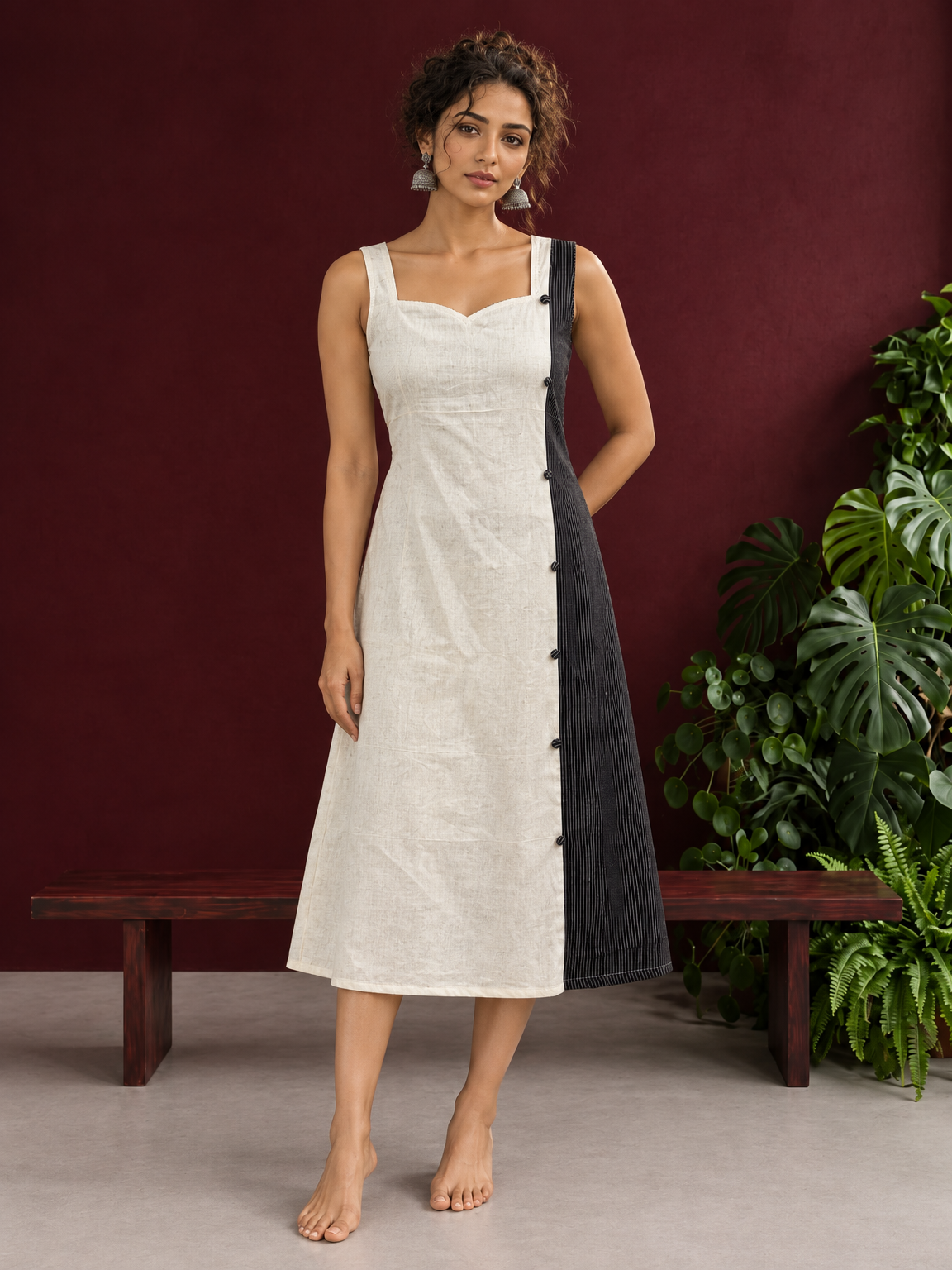 Elegant Off-White Cotton A-Line Dress with Contrast Black Pinstripe Side Panel & Button Detailing — front view