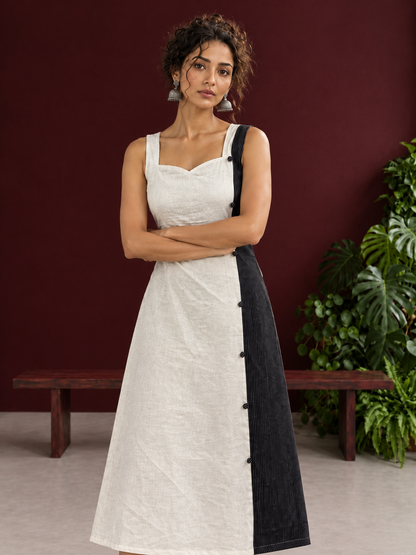 Elegant Off-White Cotton A-Line Dress with Contrast Black Pinstripe Side Panel & Button Detailing — styled view