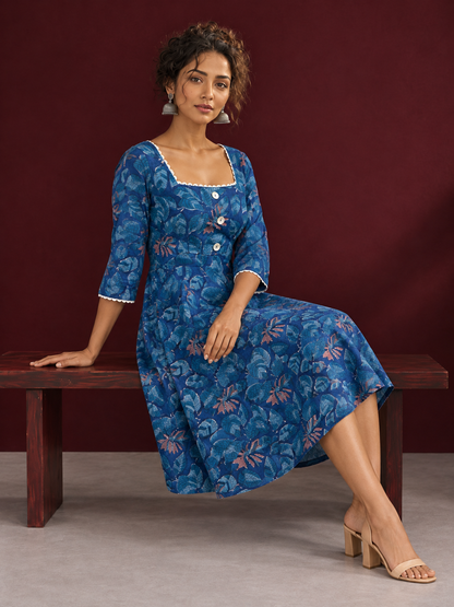 Classic Blue Cotton One Piece Dress with Printed Leaf Motifs & Lace Trim Square Neck — seated