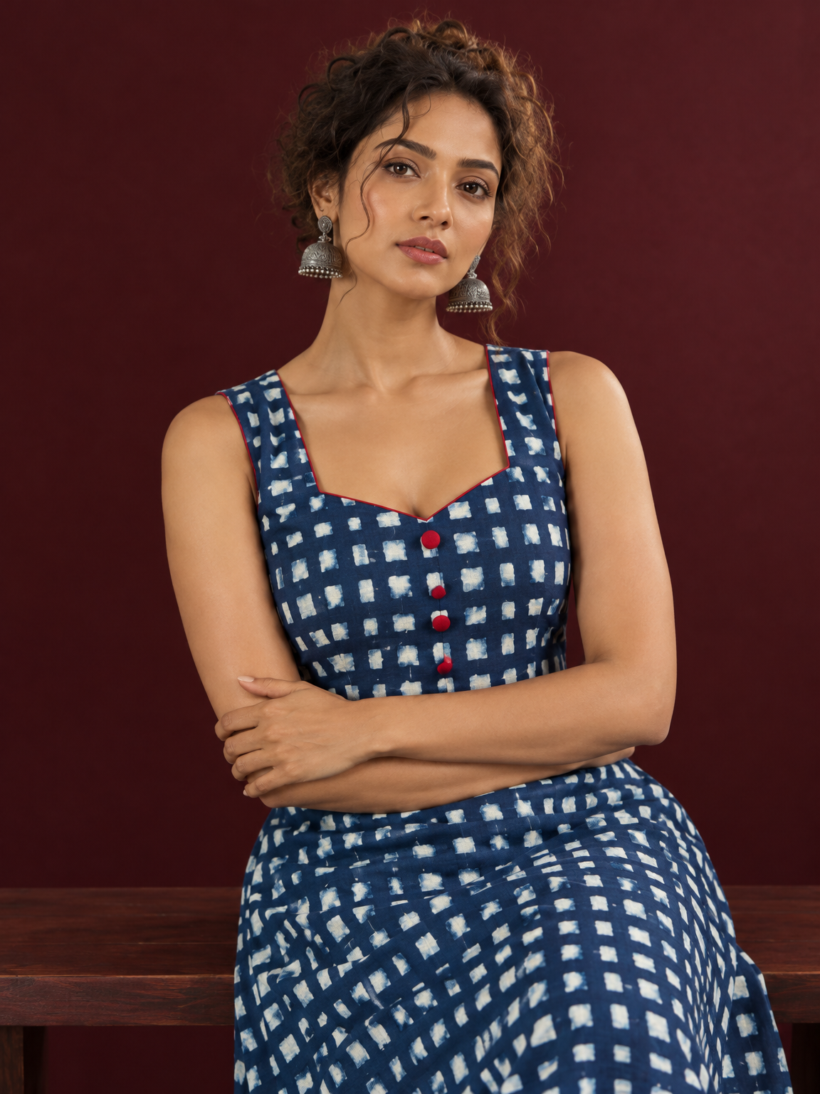 Indigo Blue Cotton One Piece Dress with Contrast Maroon Piping & Button Detail — seated detail — view 5