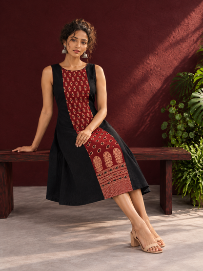 Timeless Black Cotton A-Line Dress with Maroon Ajrakh Print Center Panel & Contrast Piping — seated