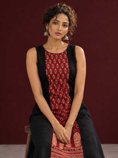 Timeless Black Cotton A-Line Dress with Maroon Ajrakh Print Center Panel & Contrast Piping — seated detail