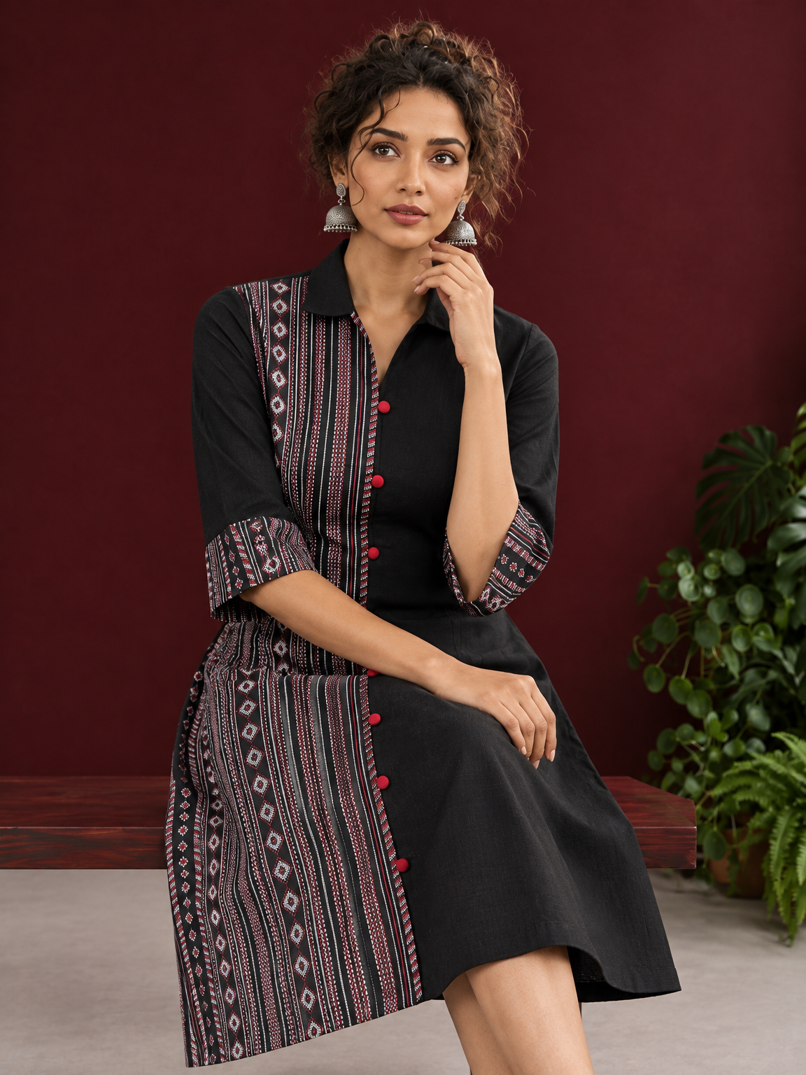 Timeless Black Cotton Shirt Dress with Contrast Striped Panel & Coordinated Sleeve Cuffs — seated detail — view 6