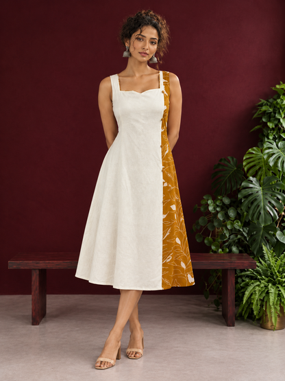 Elegant Off-White Cotton One Piece Dress with Mustard Floral Print Side Panel & Button Detailing — side view